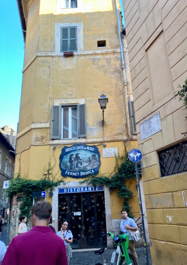 People walking through a crowded street